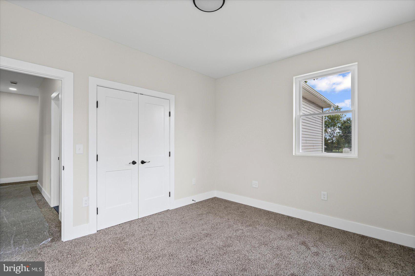 9534 Bauer Avenue Baltimore, MD 21236 - Photo 30 of 53 a view of an empty room with a window