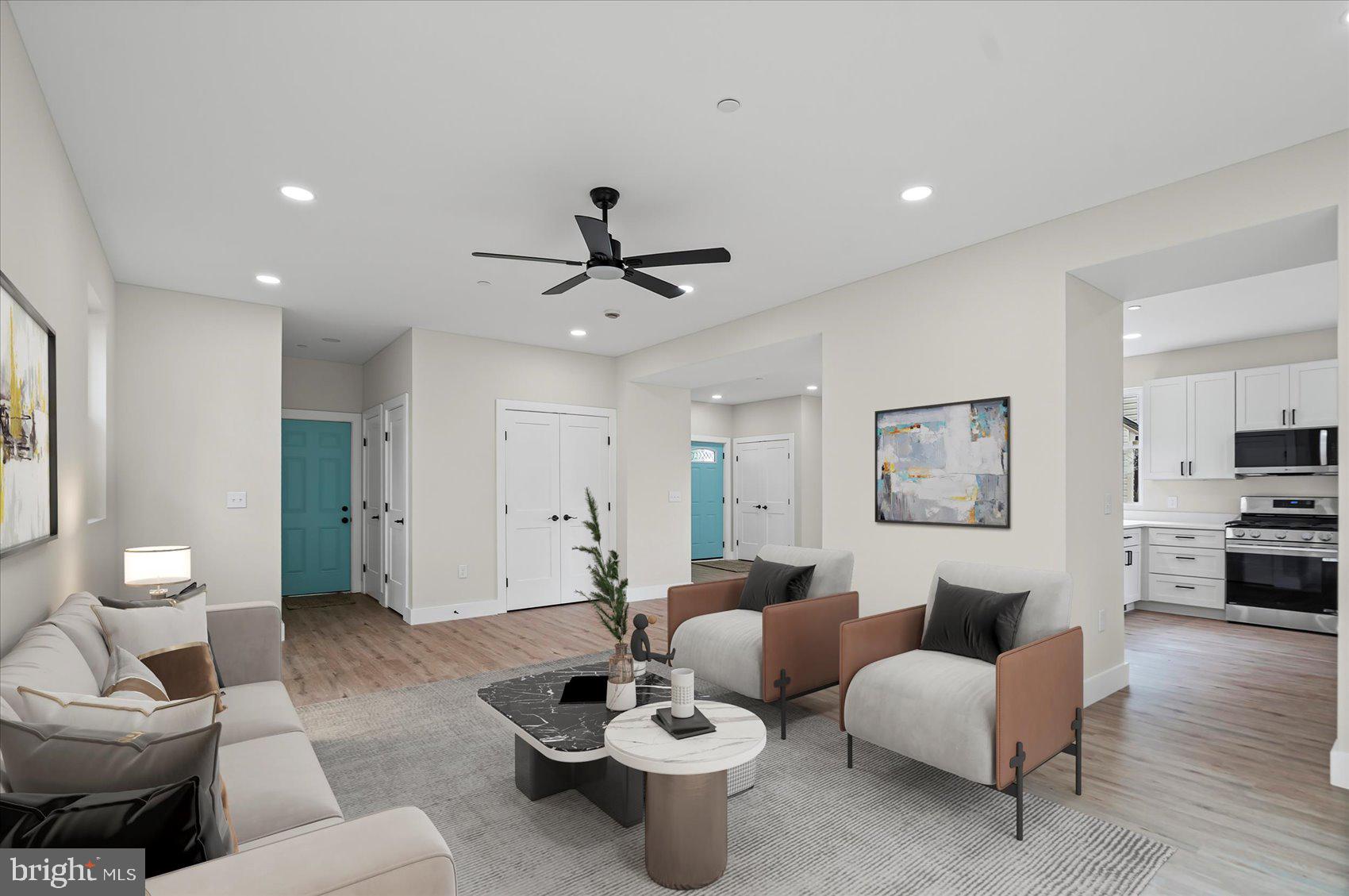 9534 Bauer Avenue Baltimore, MD 21236 - Photo 3 of 53 a living room with furniture and a wooden floor