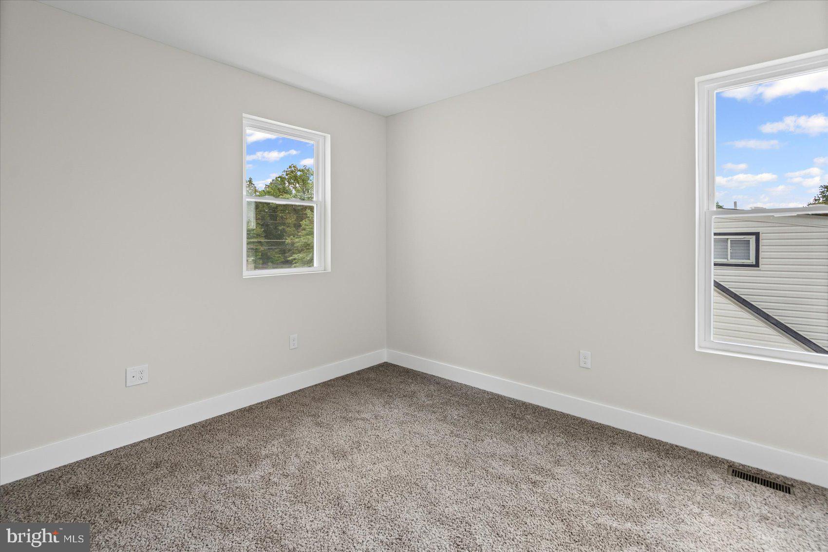 9534 Bauer Avenue Baltimore, MD 21236 - Photo 32 of 53 an empty room with a window