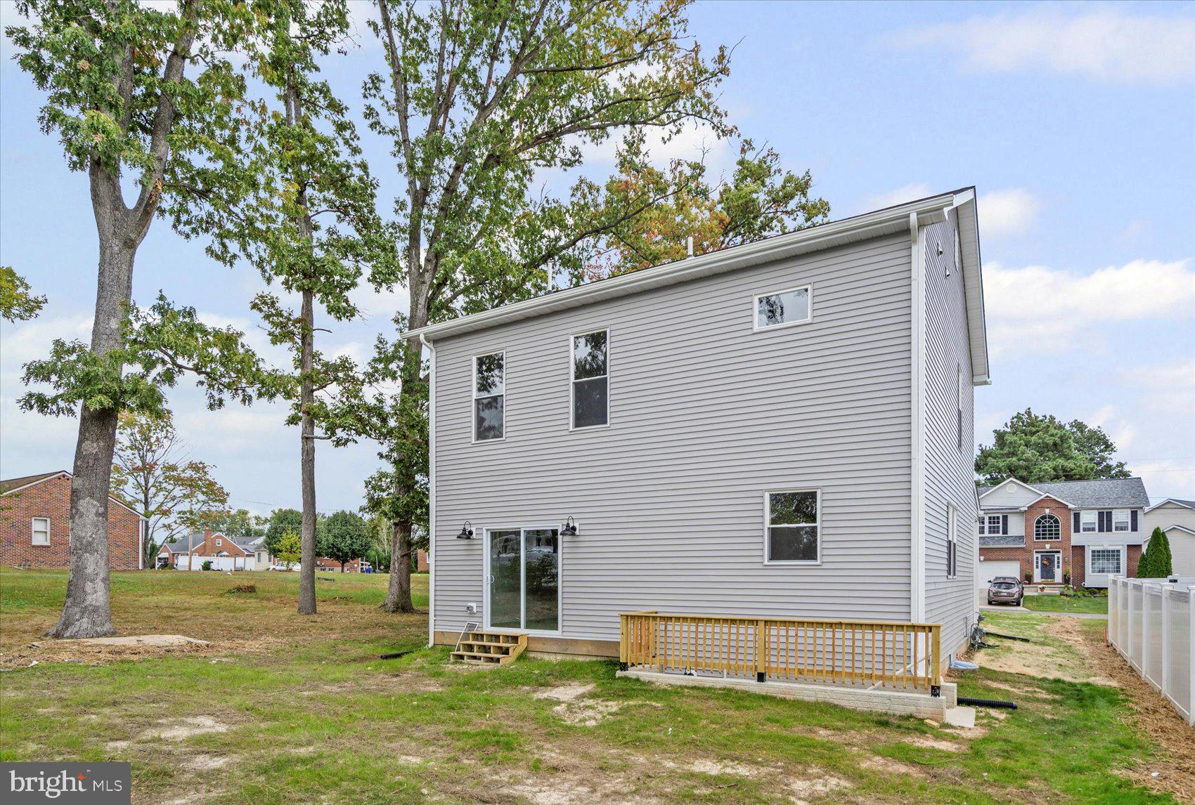 9534 Bauer Avenue Baltimore, MD 21236 - Photo 45 of 53 a view of a house with a yard and plants