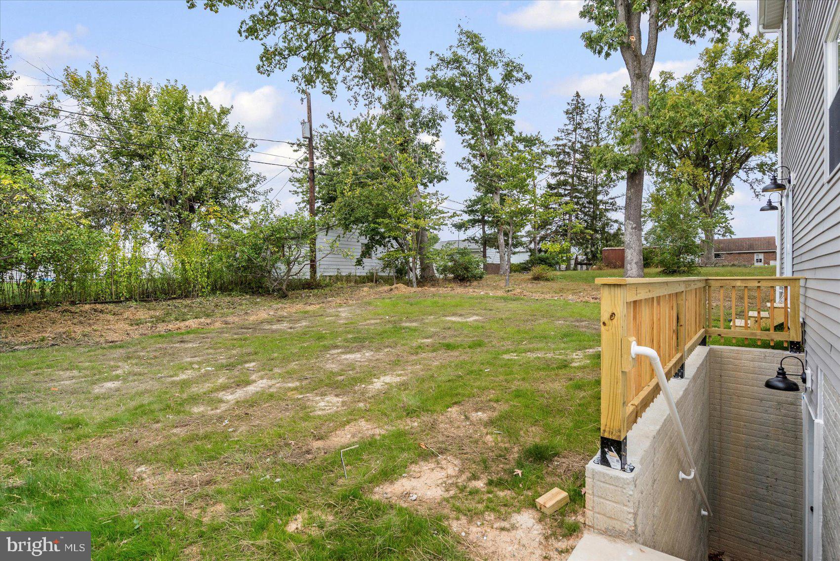 9534 Bauer Avenue Baltimore, MD 21236 - Photo 47 of 53 a view of a yard with a trees