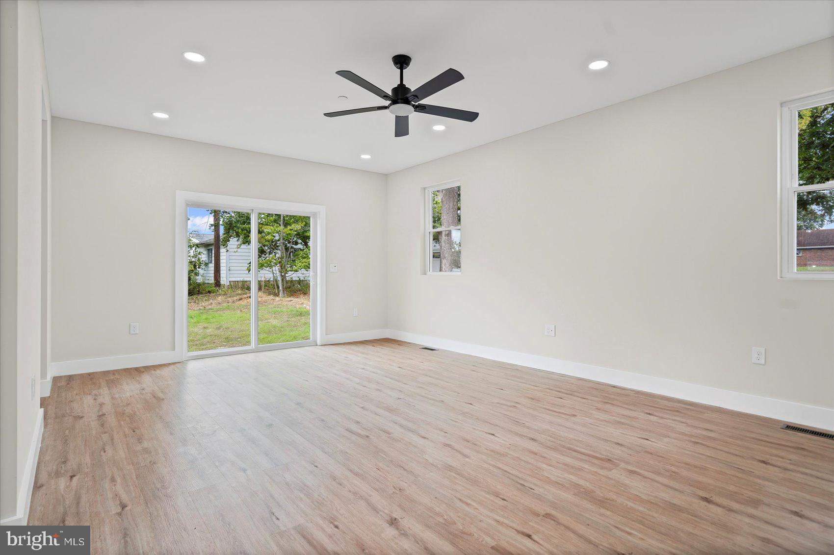 9534 Bauer Avenue Baltimore, MD 21236 - Photo 5 of 53 a view of an empty room with a window