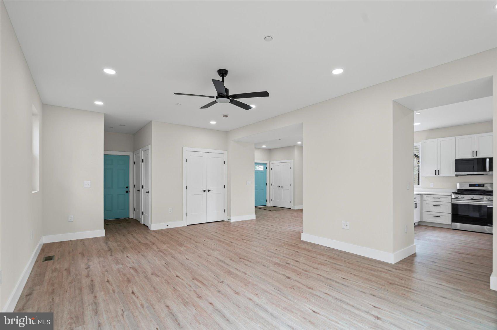 9534 Bauer Avenue Baltimore, MD 21236 - Photo 7 of 53 a view of a kitchen with a sink and a refrigerator