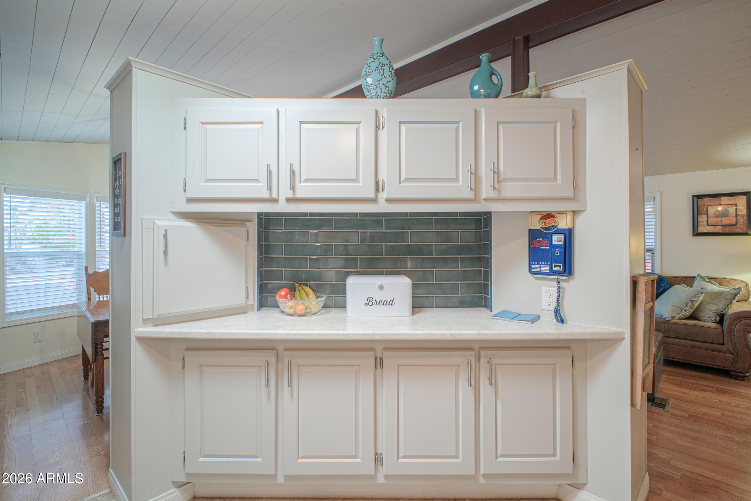 2100 North Trekell Road, Unit 290 Casa Grande, AZ 85122 - Photo 13 of 35 a kitchen with white cabinets and a sink