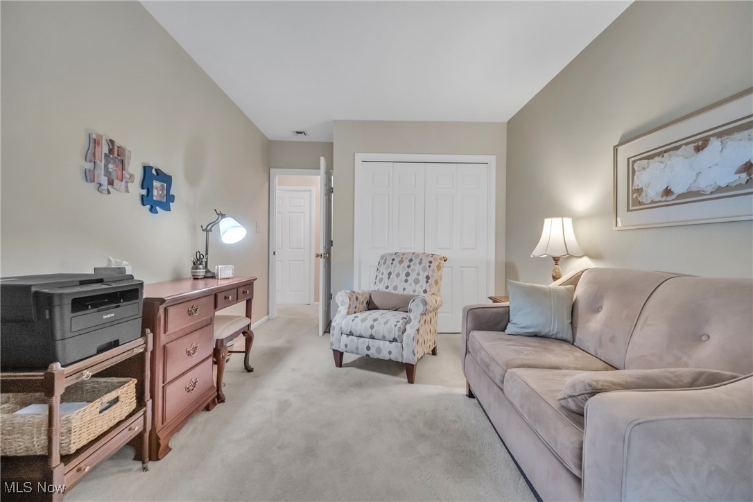 22481 Center Ridge Road, Unit 202 Rocky River, OH 44116 - Photo 13 of 24 View of carpeted living room