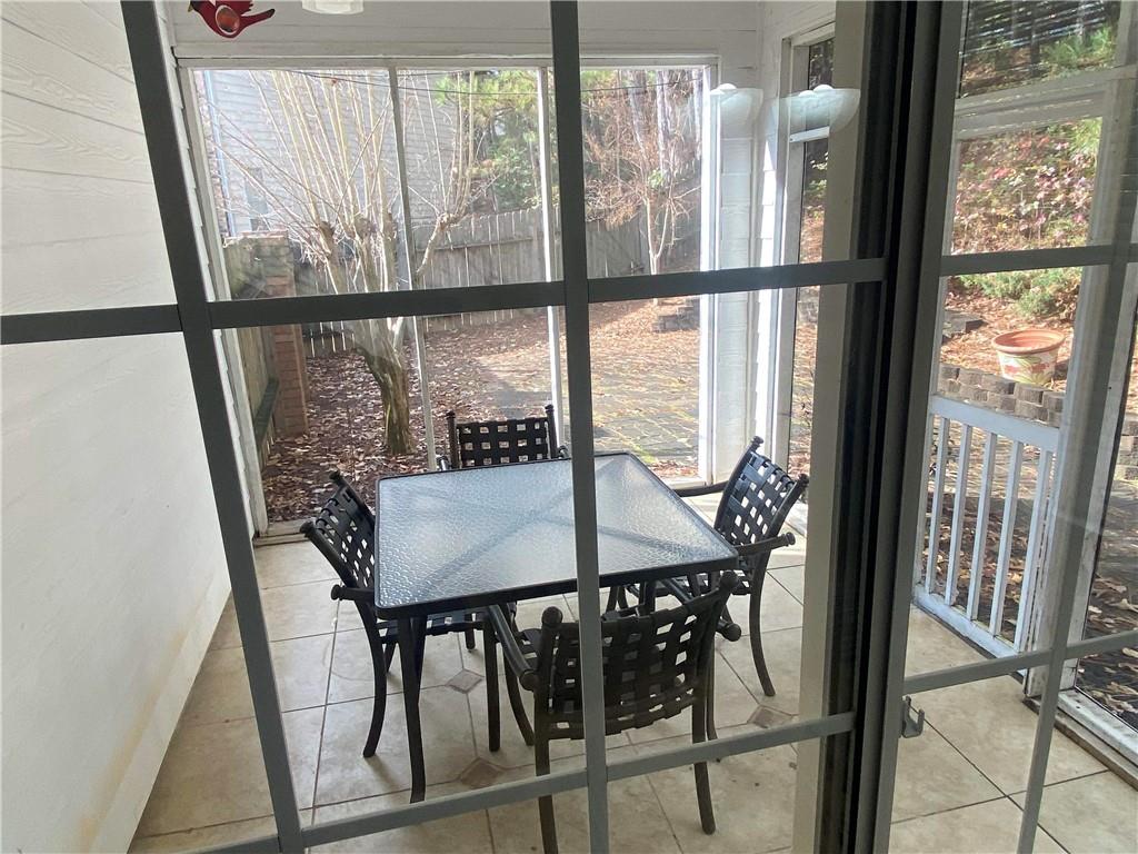 541 Cascade Hills Court Southwest Atlanta, GA 30331 - Photo 20 of 38 a view of a dining room with furniture window and wooden floor