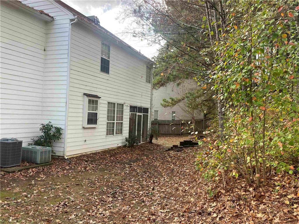 541 Cascade Hills Court Southwest Atlanta, GA 30331 - Photo 3 of 38 a view of a house with a yard