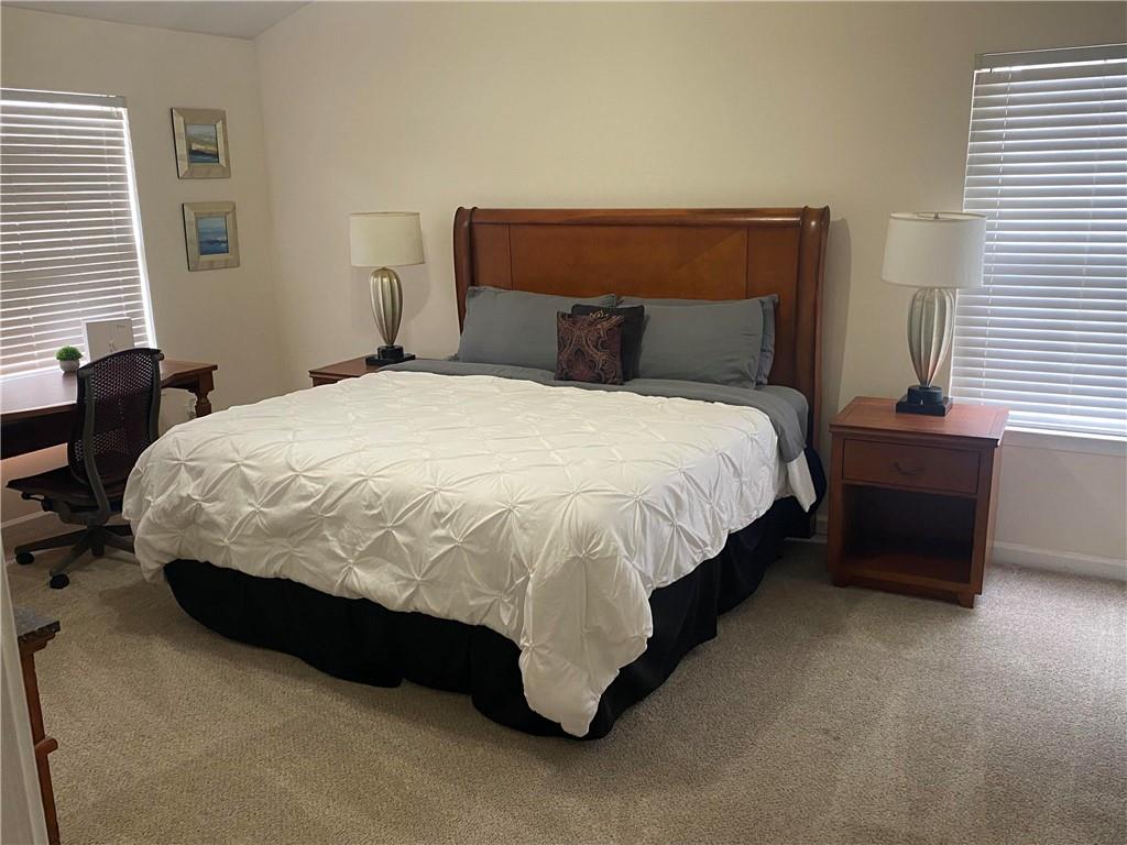 541 Cascade Hills Court Southwest Atlanta, GA 30331 - Photo 38 of 38 a bedroom with a bed and window