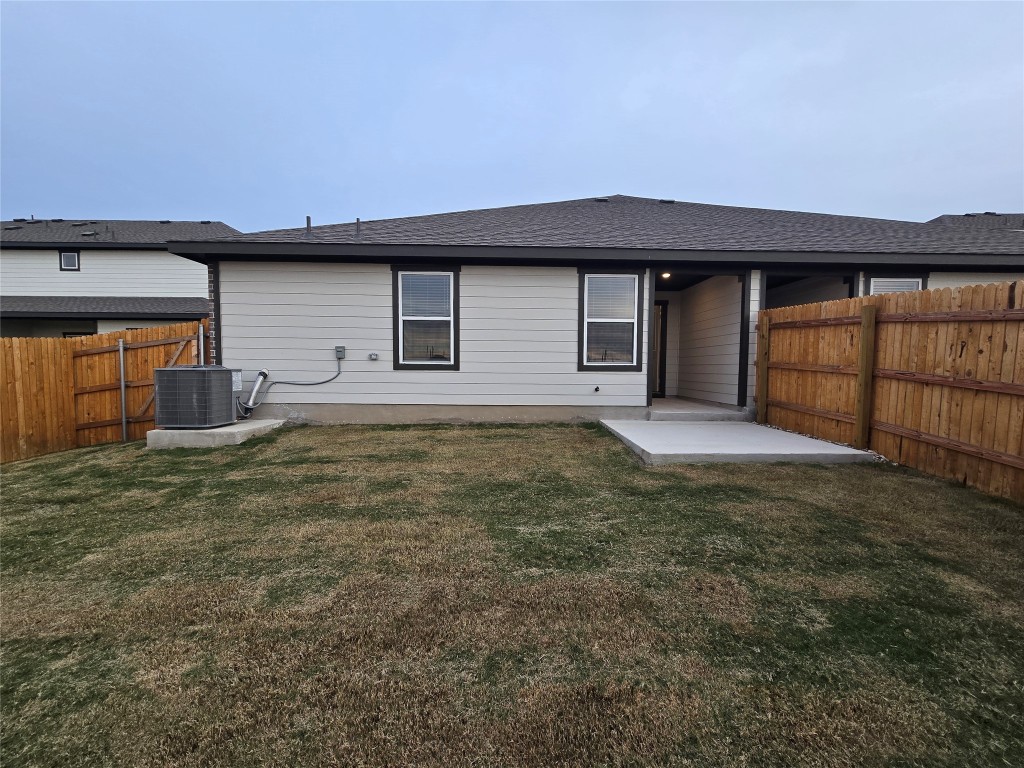 15016 B Welsh Cob Road, Unit B Manor, TX 78653 - Photo 13 of 14 a backyard of a house