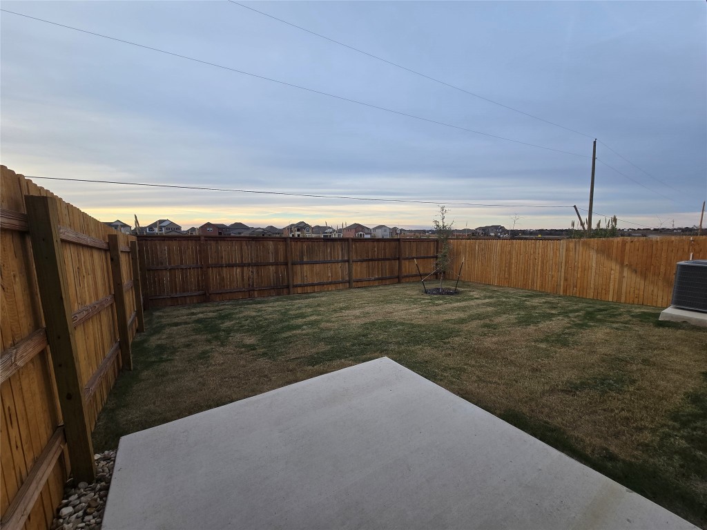 15016 B Welsh Cob Road, Unit B Manor, TX 78653 - Photo 14 of 14 a view of backyard with wooden fence