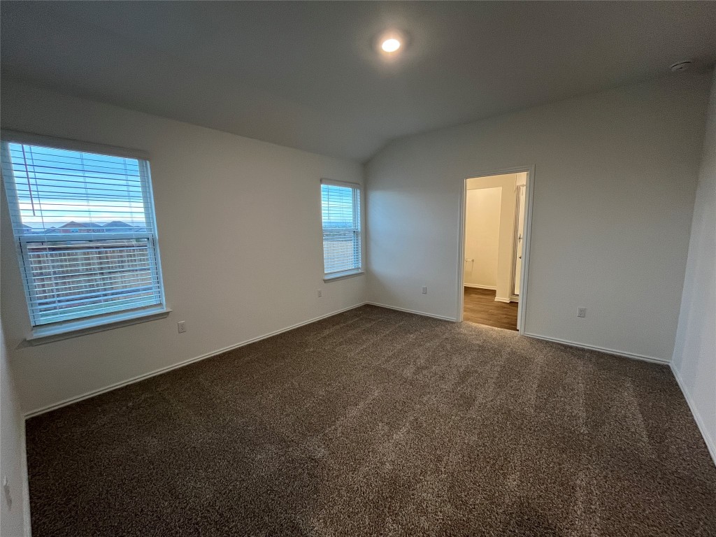 15016 B Welsh Cob Road, Unit B Manor, TX 78653 - Photo 6 of 14 an empty room with a window