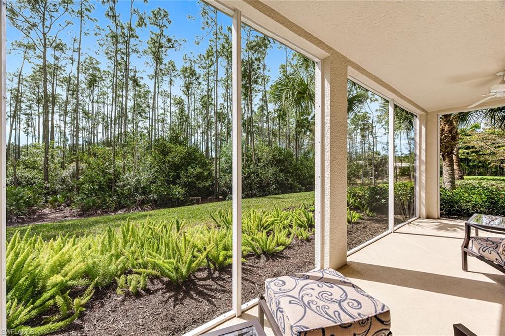 6969 Avalon Circle, Unit 1504 Naples, FL 34112 - Photo 27 of 42 a view of backyard with plants and outdoor seating