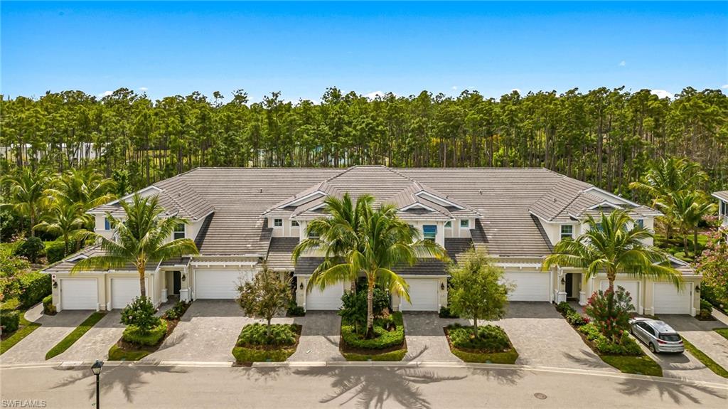 6969 Avalon Circle, Unit 1504 Naples, FL 34112 - Photo 3 of 42 an aerial view of multiple house