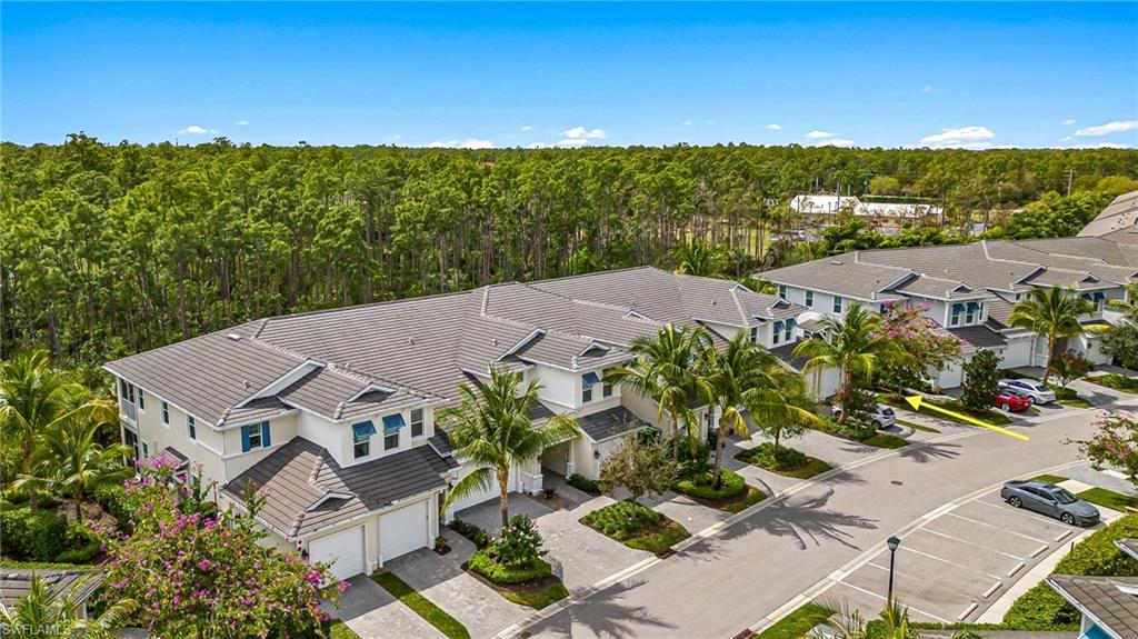 6969 Avalon Circle, Unit 1504 Naples, FL 34112 - Photo 40 of 42 an aerial view of multiple house