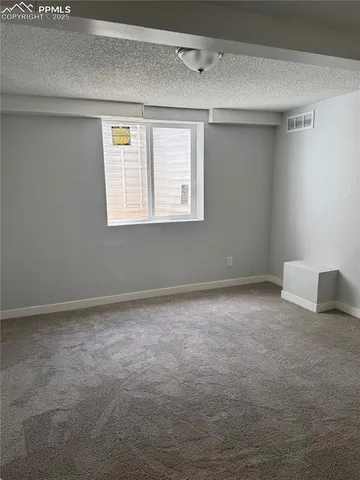 an empty room with a workbench