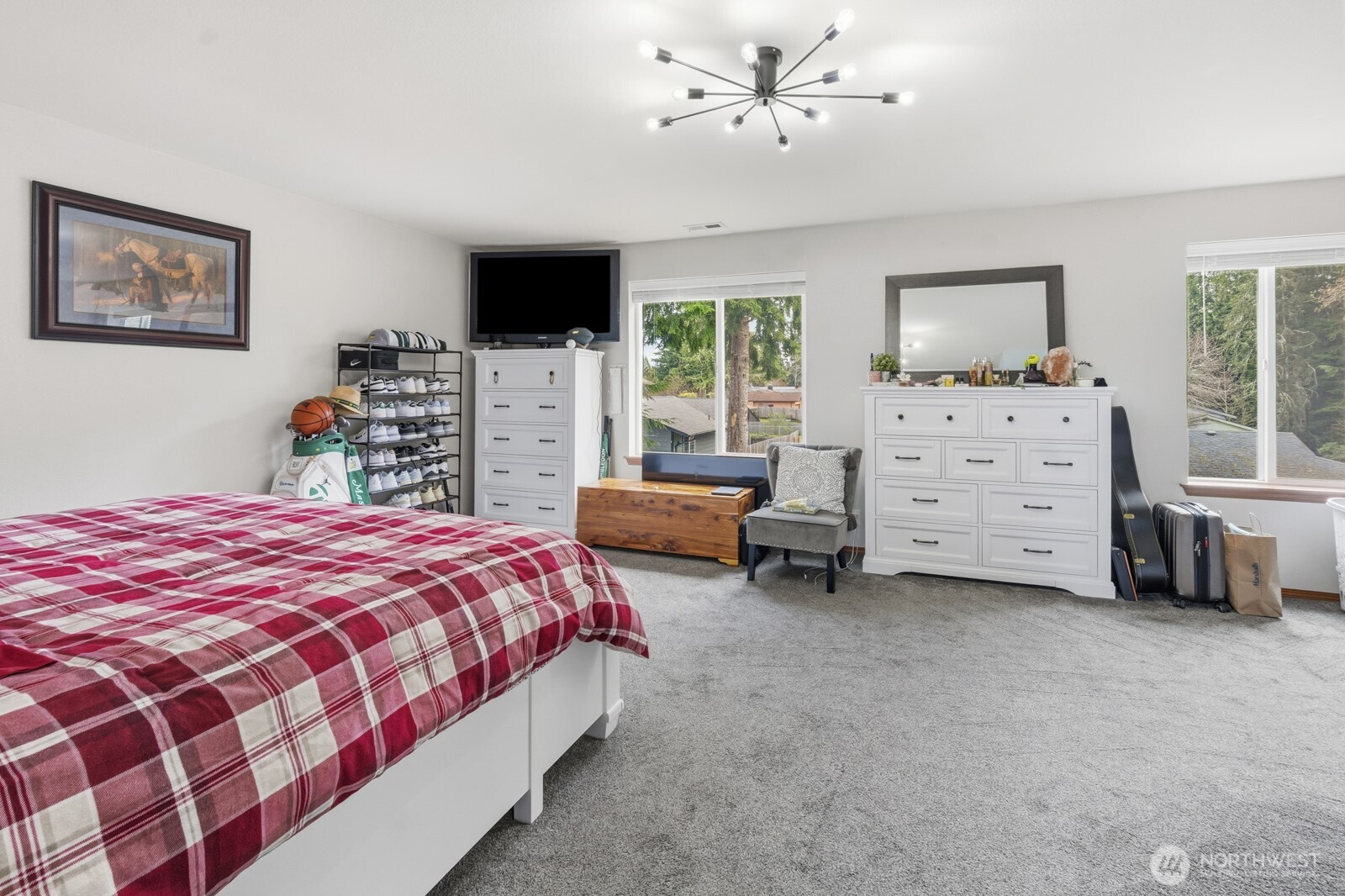 1804 Harborview Drive Aberdeen, WA 98520 - Photo 13 of 30 a bedroom with a bed and a flat tv screen