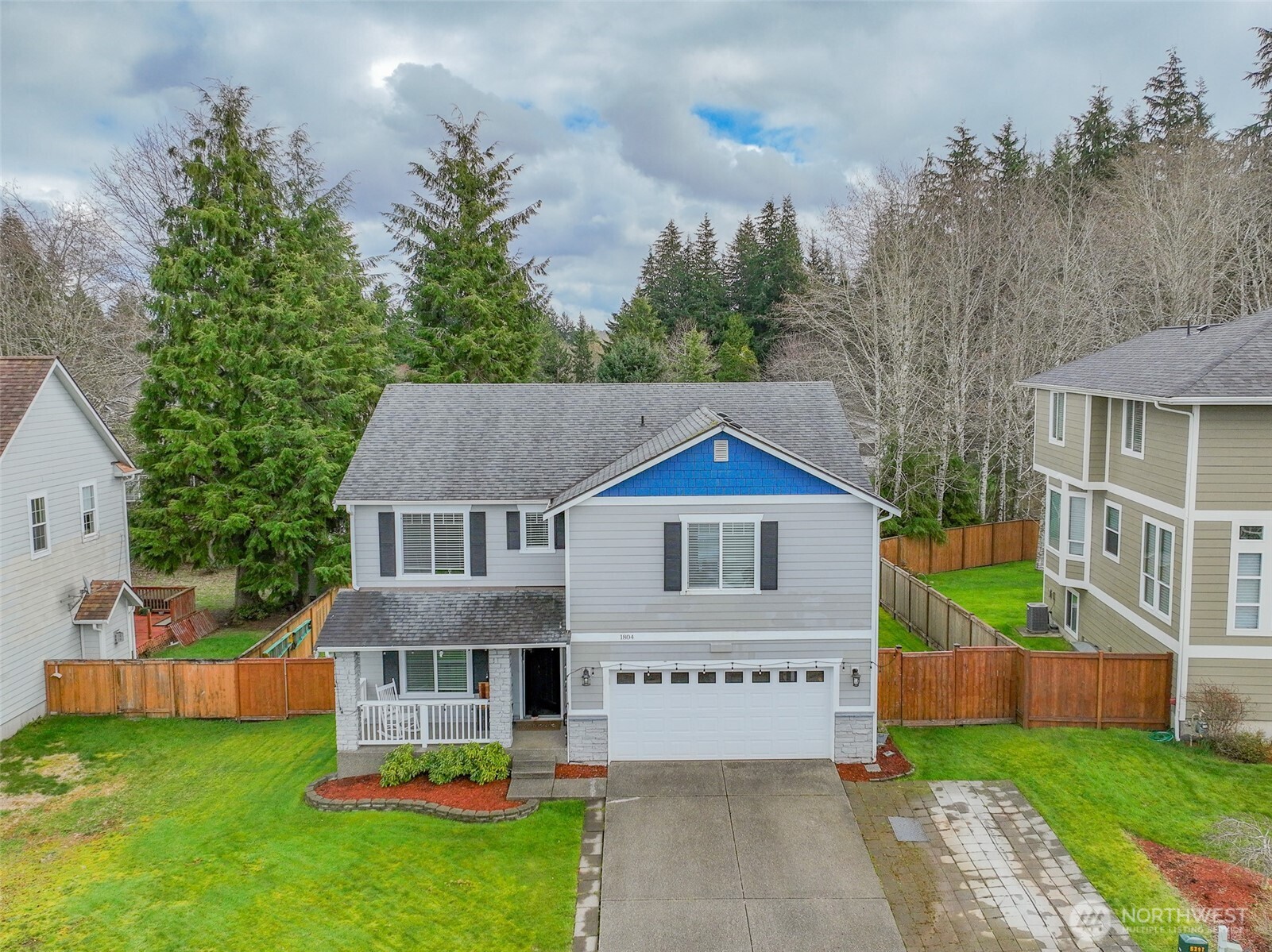 1804 Harborview Drive Aberdeen, WA 98520 - Photo 2 of 30 a front view of a house with a yard table and chairs