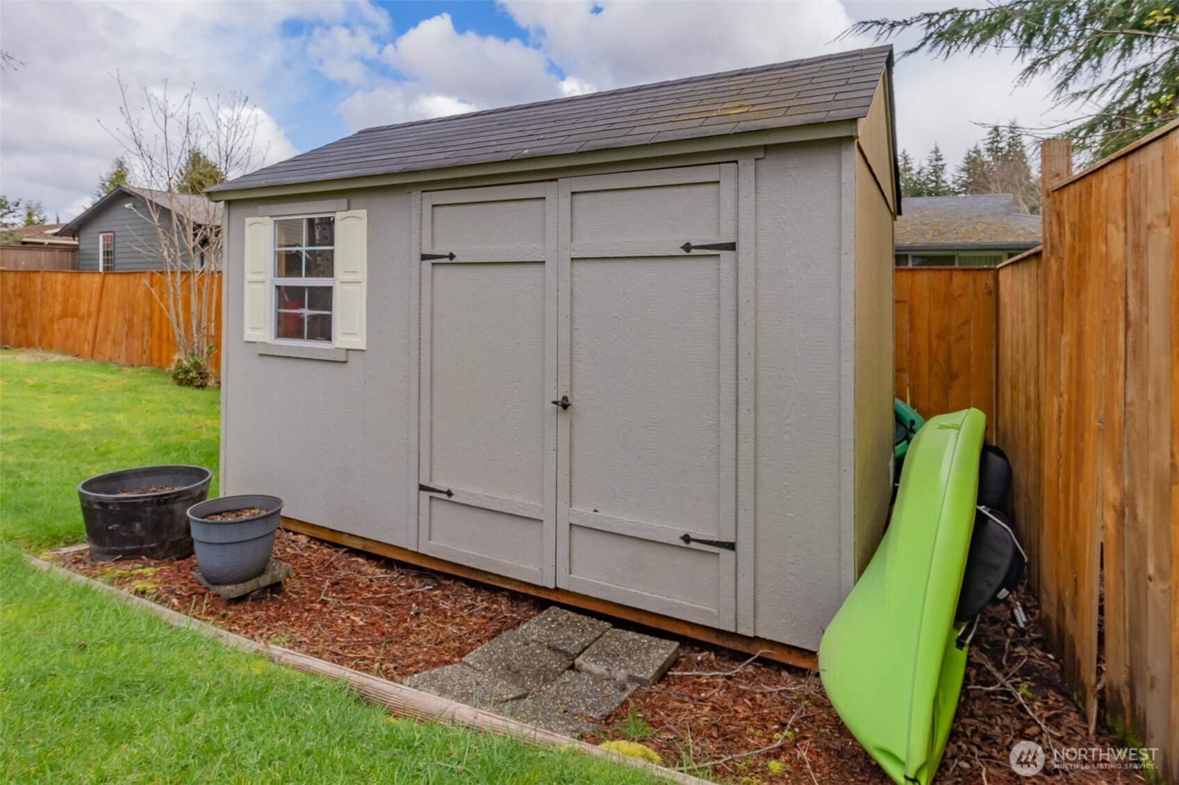 1804 Harborview Drive Aberdeen, WA 98520 - Photo 27 of 30 a view of a backyard with a potted plant