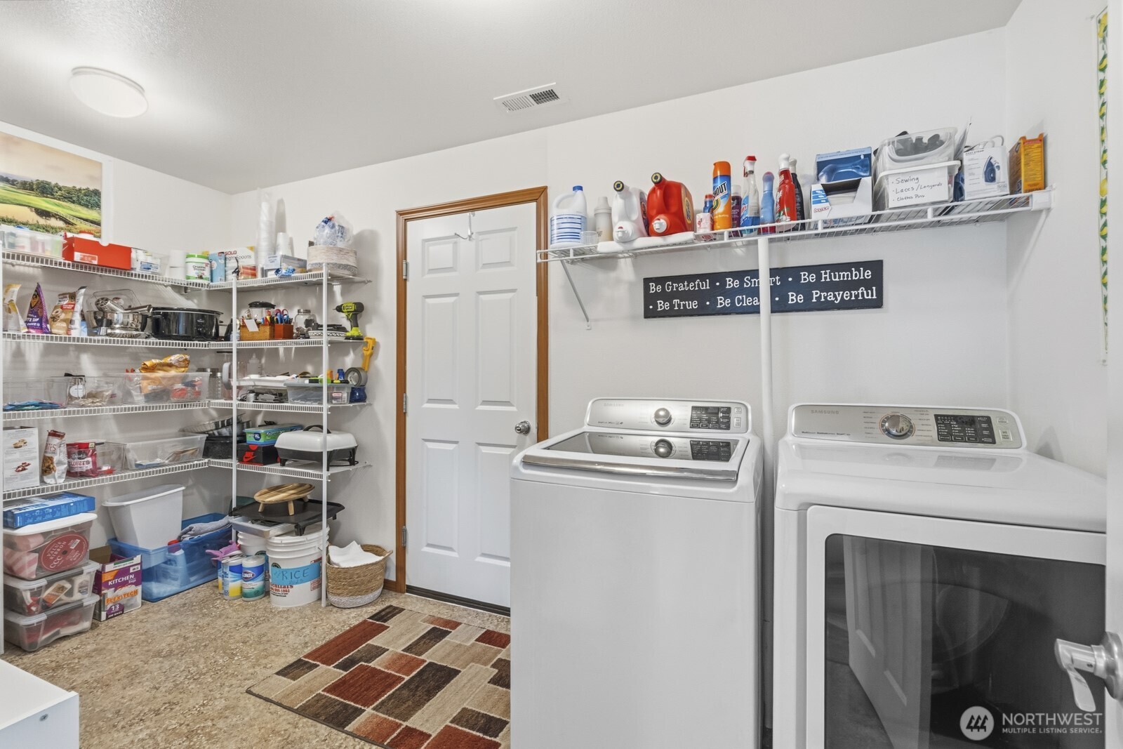 1804 Harborview Drive Aberdeen, WA 98520 - Photo 7 of 30 a utility room with fridge dryer and washer