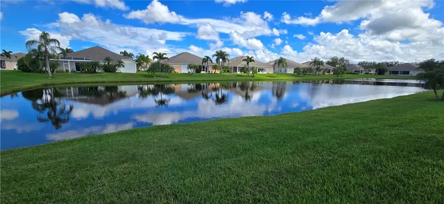 a view of a lake with a large trees