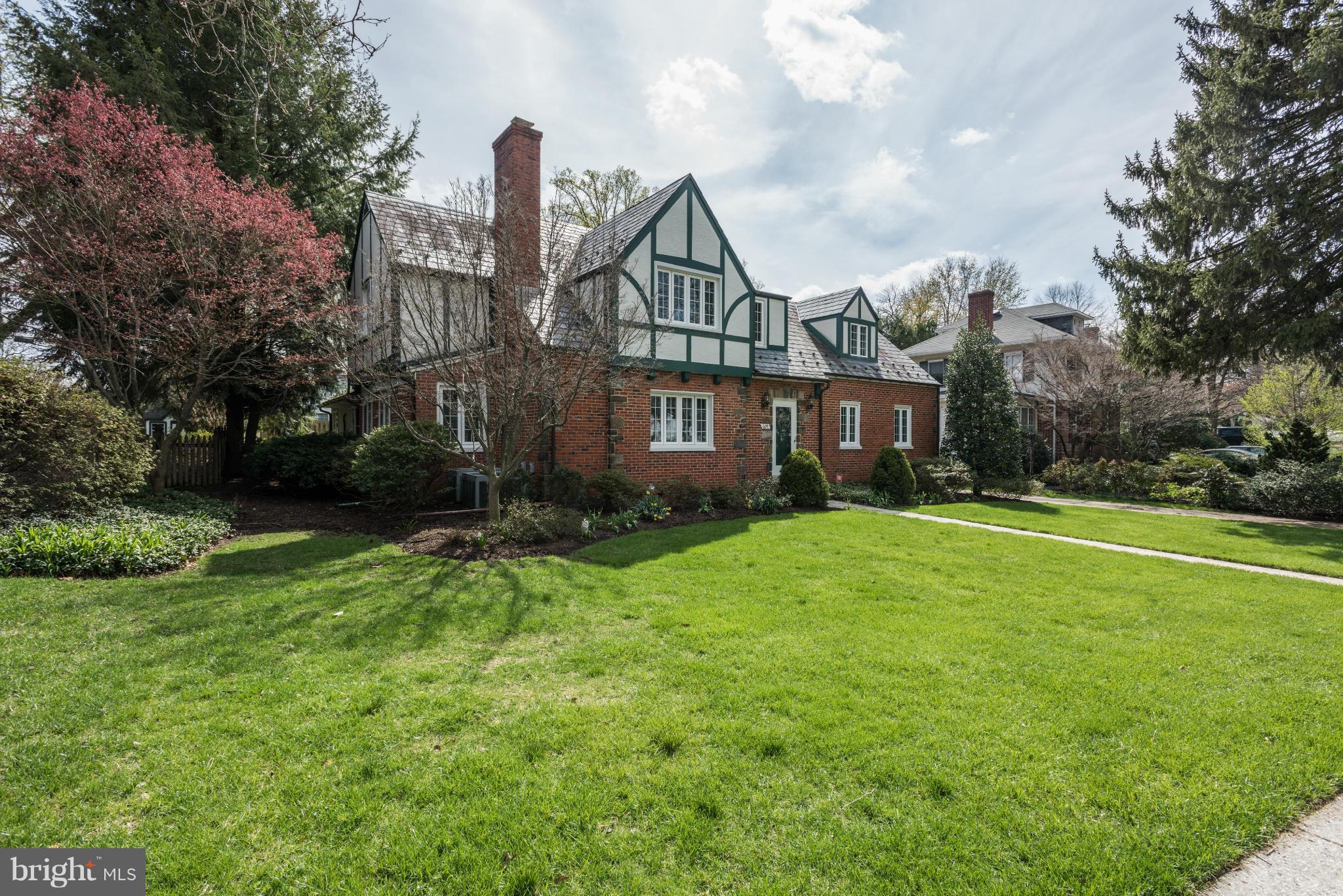 609 Chumleigh Road Baltimore, MD 21212 - Photo 2 of 30 a view of a big house with a big yard and large trees