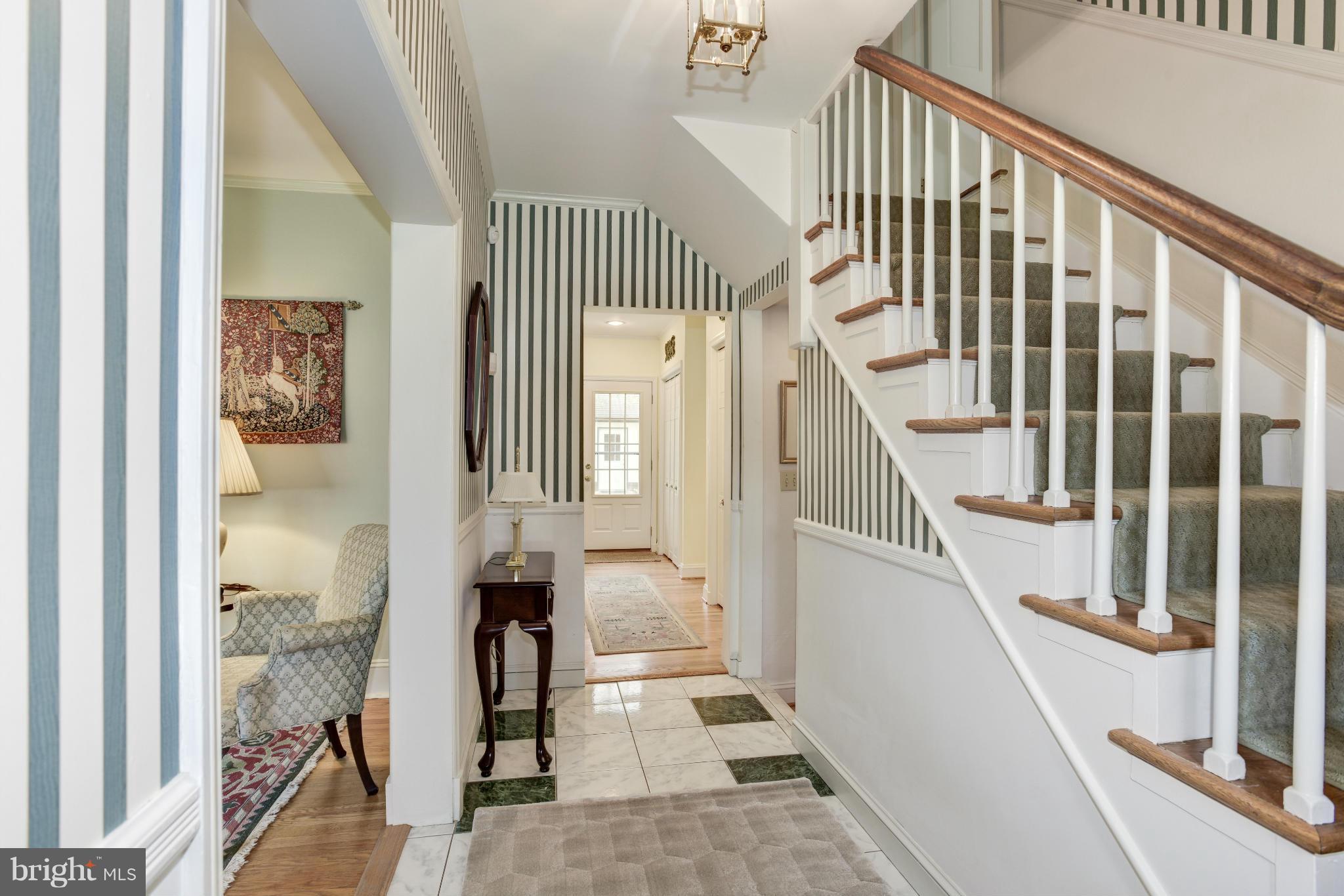 609 Chumleigh Road Baltimore, MD 21212 - Photo 4 of 30 a view of entryway and hall with wooden floor