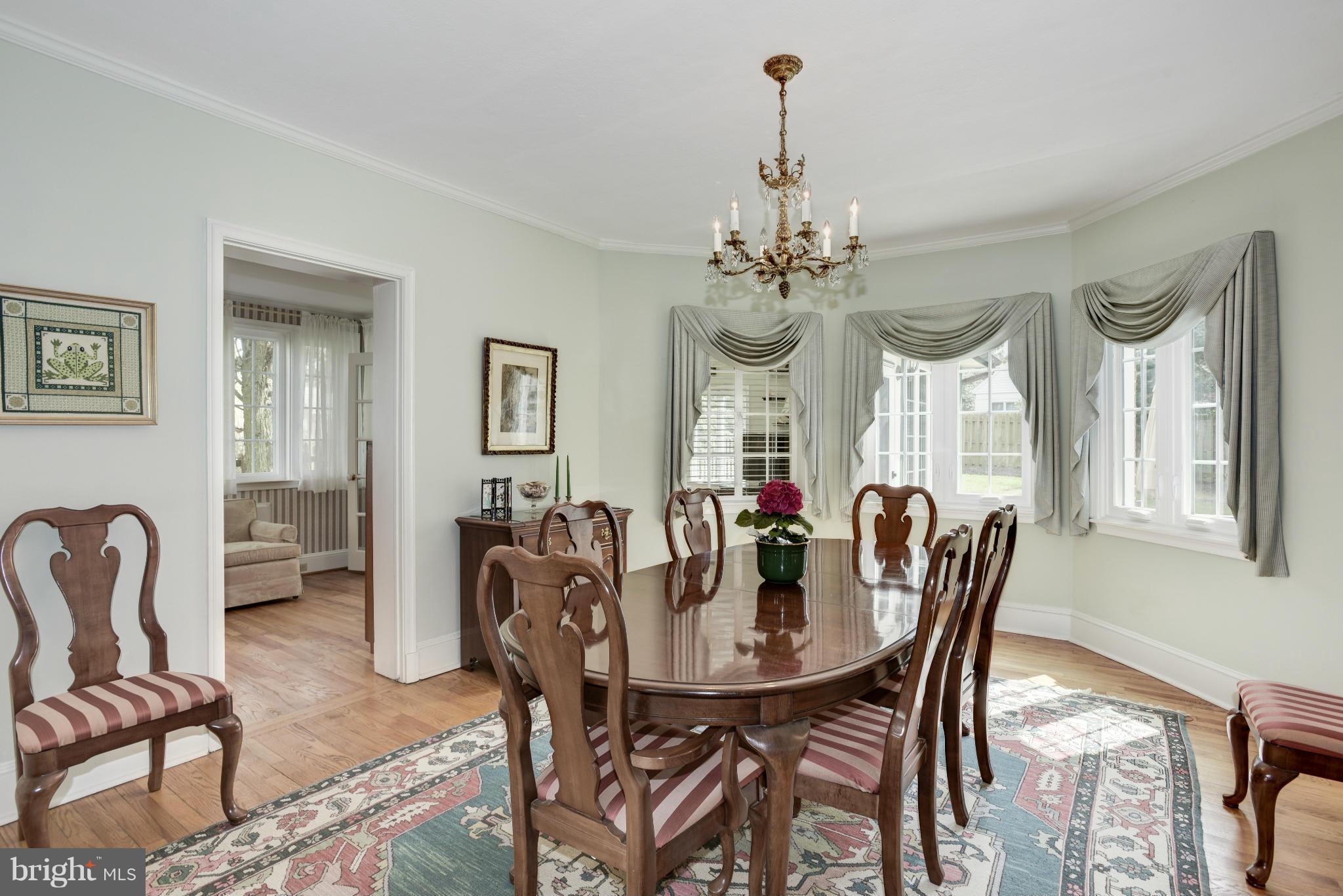 609 Chumleigh Road Baltimore, MD 21212 - Photo 9 of 30 a view of a dining room with furniture and window