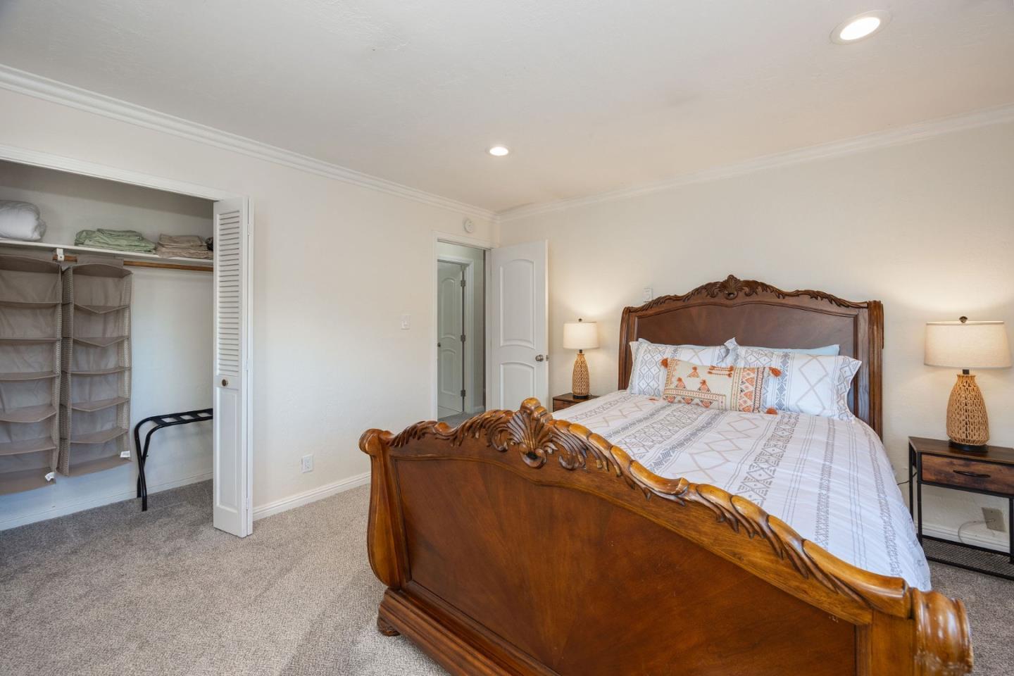 1790 Sunshine Valley Road Moss Beach, CA 94038 - Photo 14 of 30 a bed room with a bed and a chair