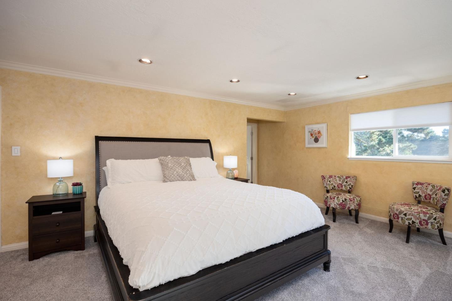 1790 Sunshine Valley Road Moss Beach, CA 94038 - Photo 18 of 30 a bedroom with a bed and a lamp