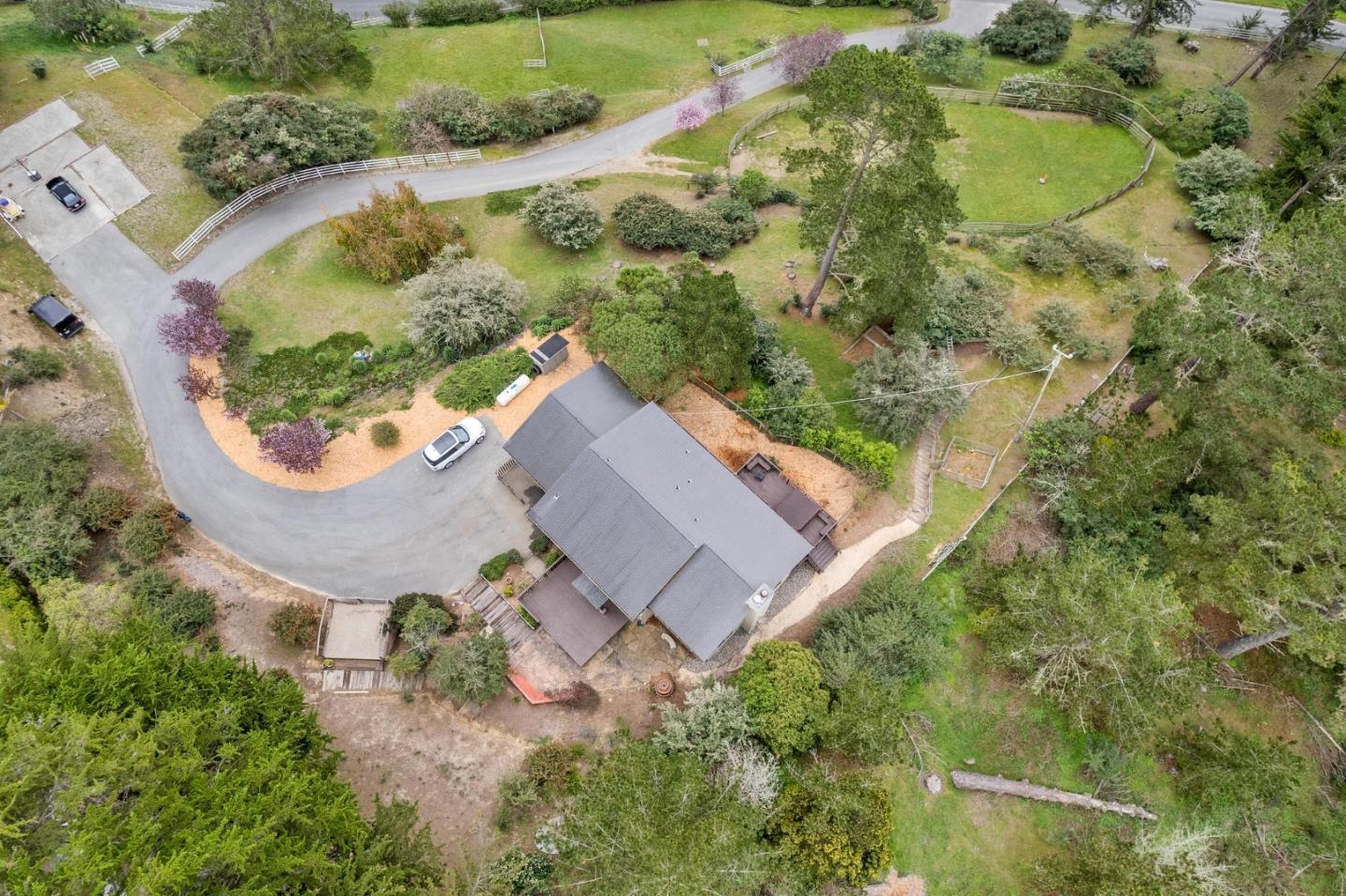 1790 Sunshine Valley Road Moss Beach, CA 94038 - Photo 26 of 30 an aerial view of a house with a garden and swimming pool