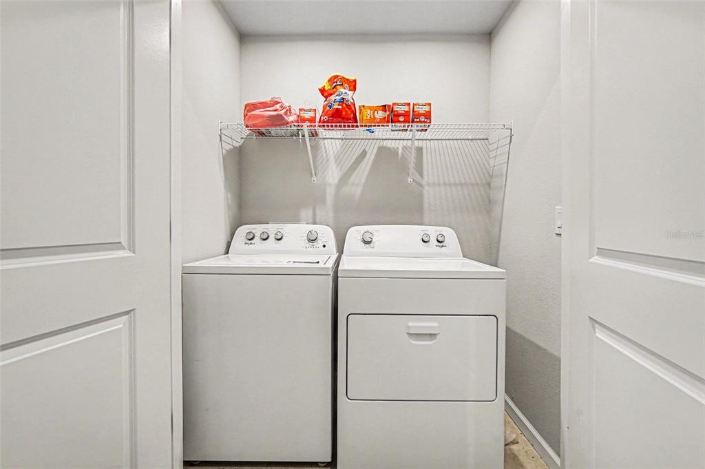 2361 Summerlit Street Lutz, FL 33558 - Photo 13 of 31 a utility room with dryer and washer