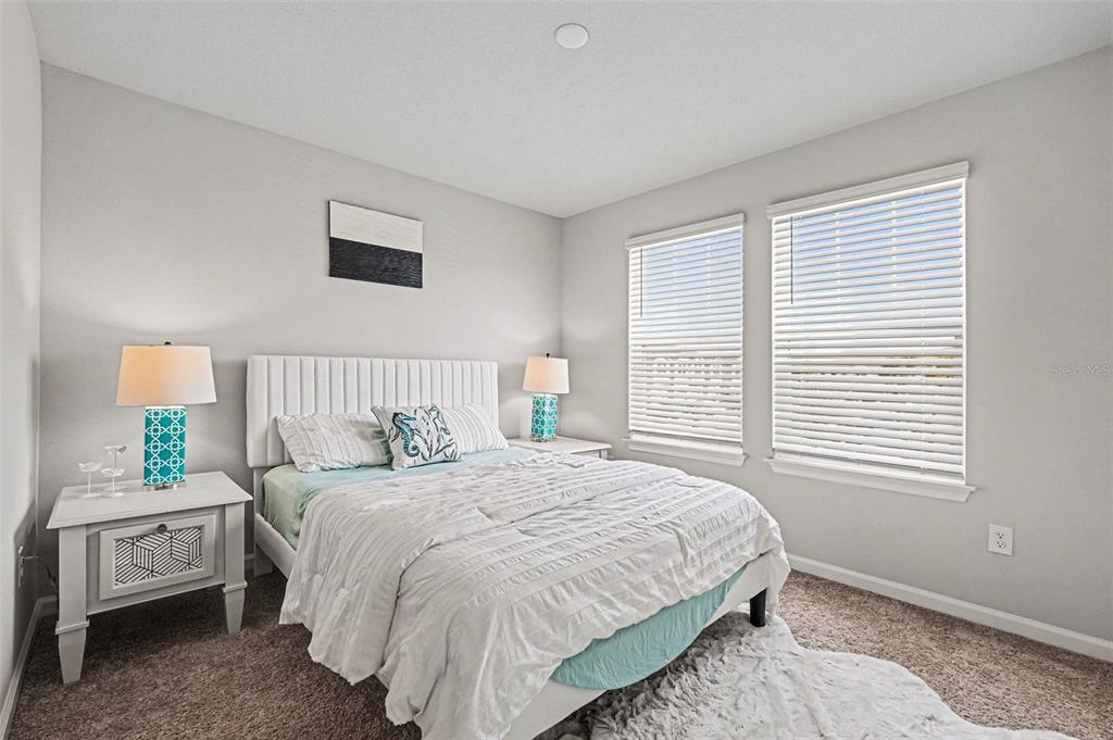 2361 Summerlit Street Lutz, FL 33558 - Photo 20 of 31 a bedroom with a bed and a window