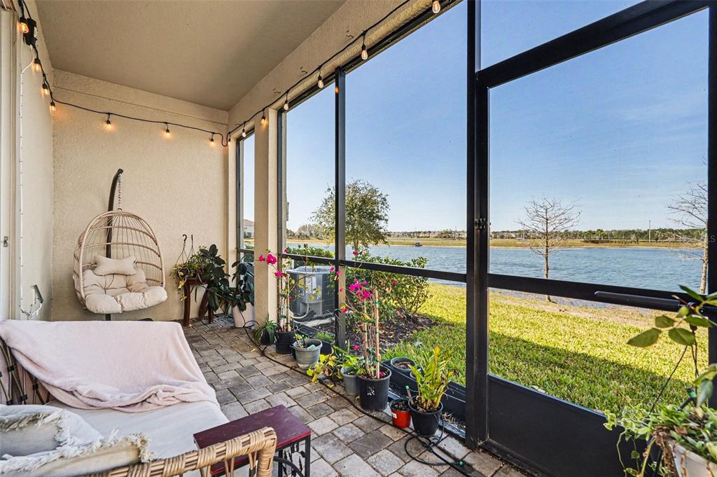 2361 Summerlit Street Lutz, FL 33558 - Photo 24 of 31 a view from a balcony with chairs