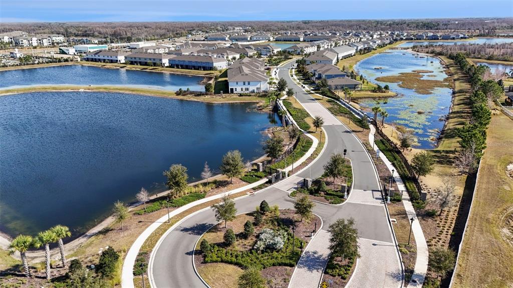 2361 Summerlit Street Lutz, FL 33558 - Photo 27 of 31 an aerial view of a house with a swimming pool