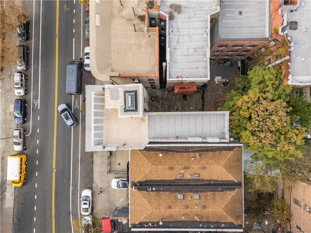 an aerial view of a building with outdoor space