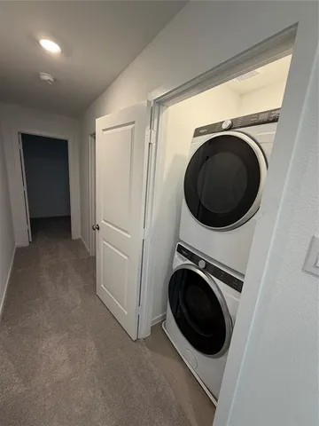 a view of a storage & utility room with washer and dryer