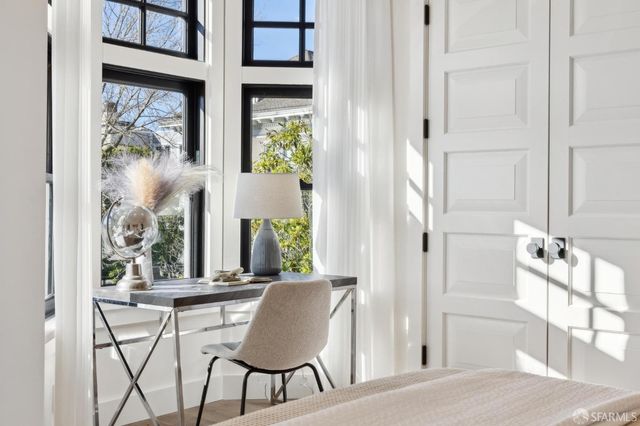 a view of a lake with a building in the background