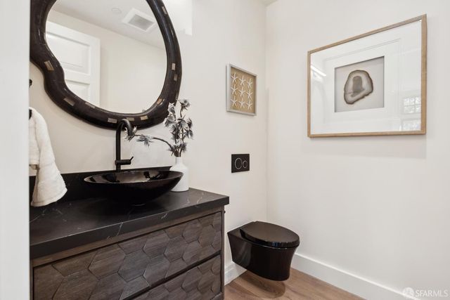 a view of a sign board with a small yard