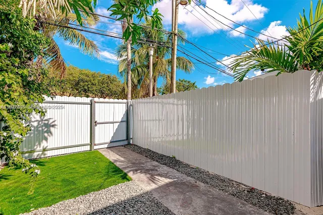 a view of a backyard with a plants
