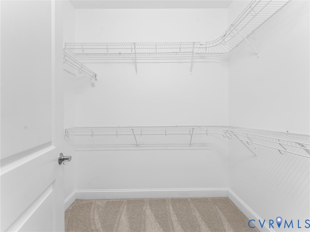 6611 Ammon Road Ford, VA 23850 - Photo 47 of 78 Spacious walk-in closet featuring wire shelving sy