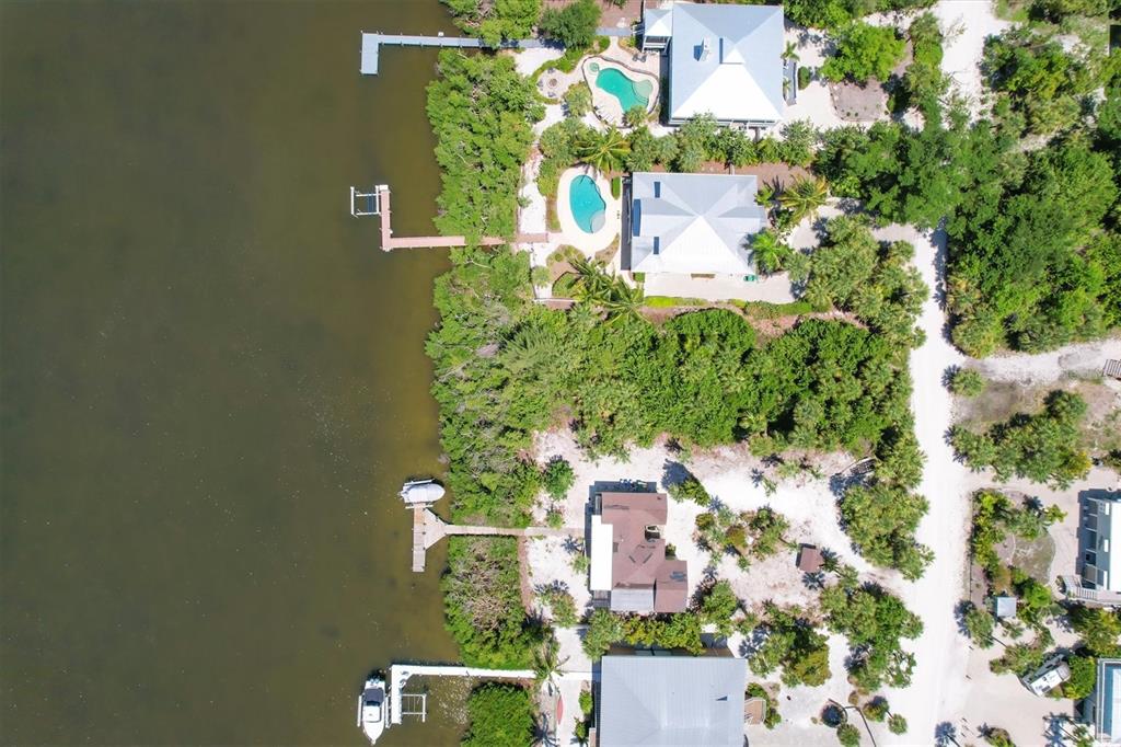 211 Kettle Harbor Drive Placida, FL 33946 - Photo 6 of 14 an aerial view of a house with a yard