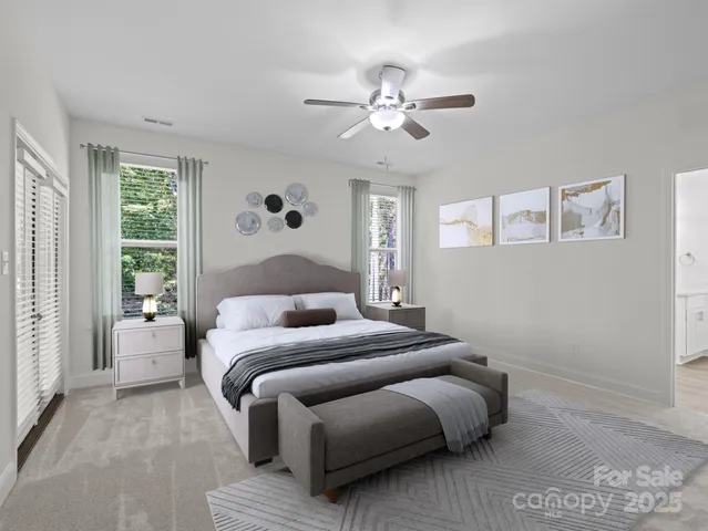 a bedroom with bed and window