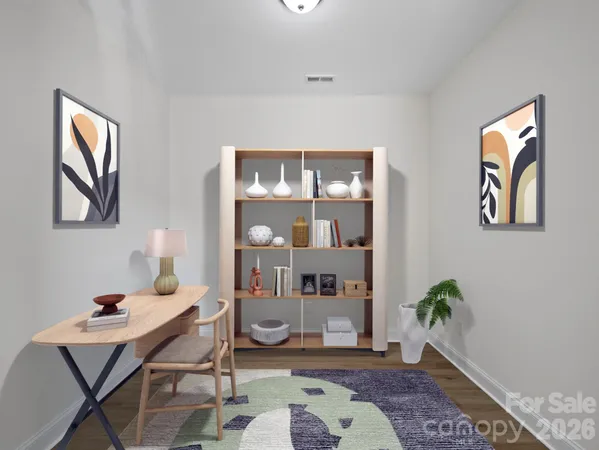 a workspace with furniture and window