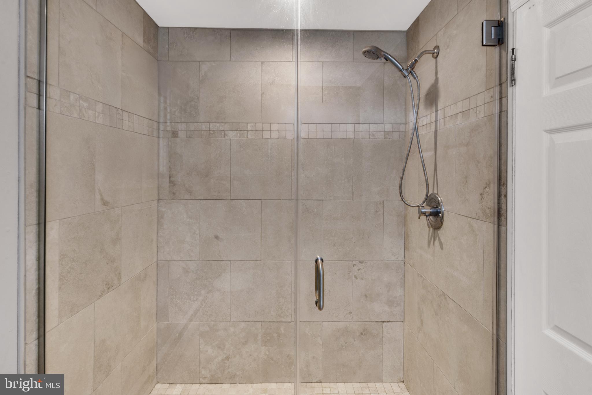 343 Andrew Road Huntingdon Valley, PA 19006 - Photo 25 of 33 spectacular travertine tile frameless shower