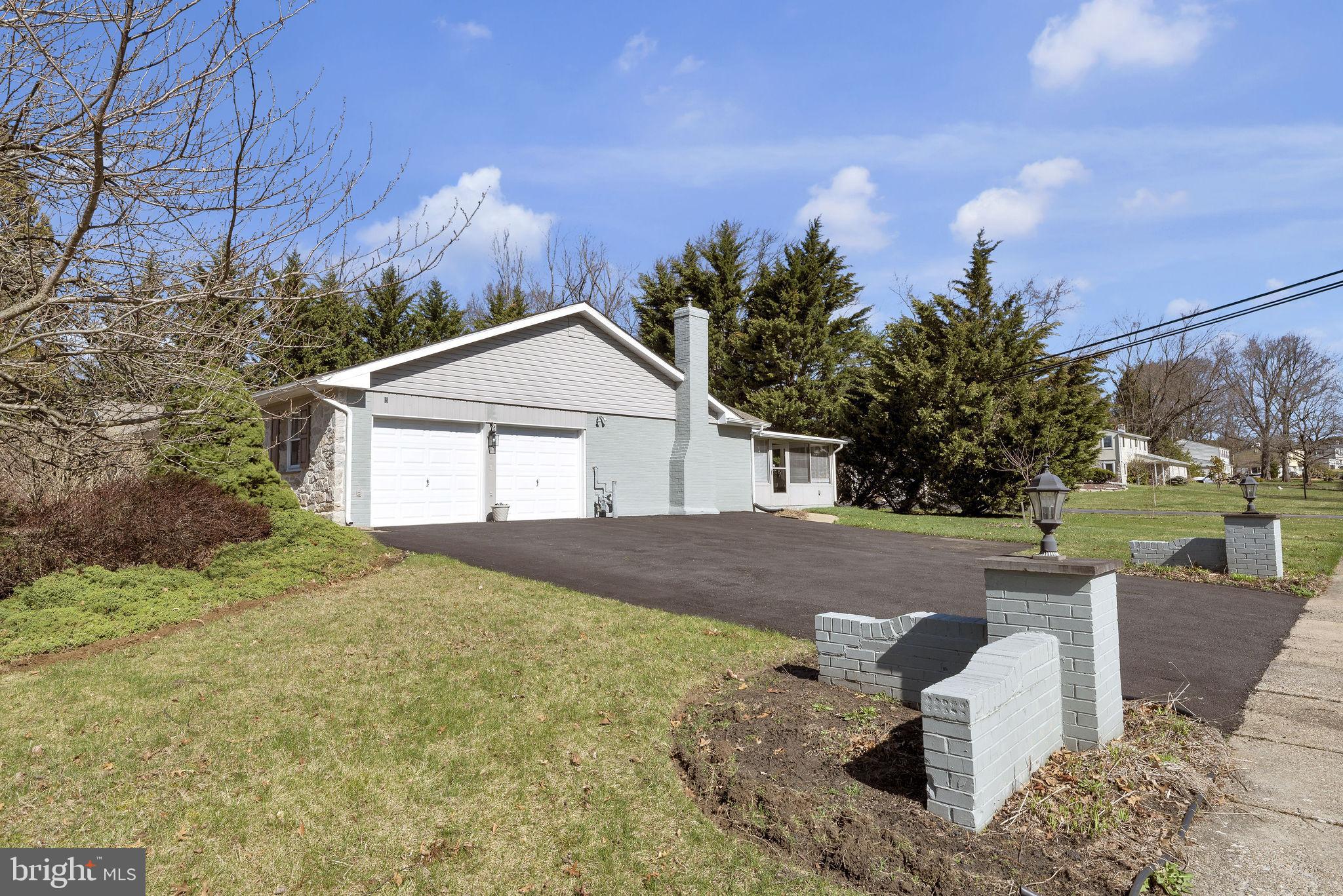 343 Andrew Road Huntingdon Valley, PA 19006 - Photo 29 of 33 oversized two-car garage with ample storage