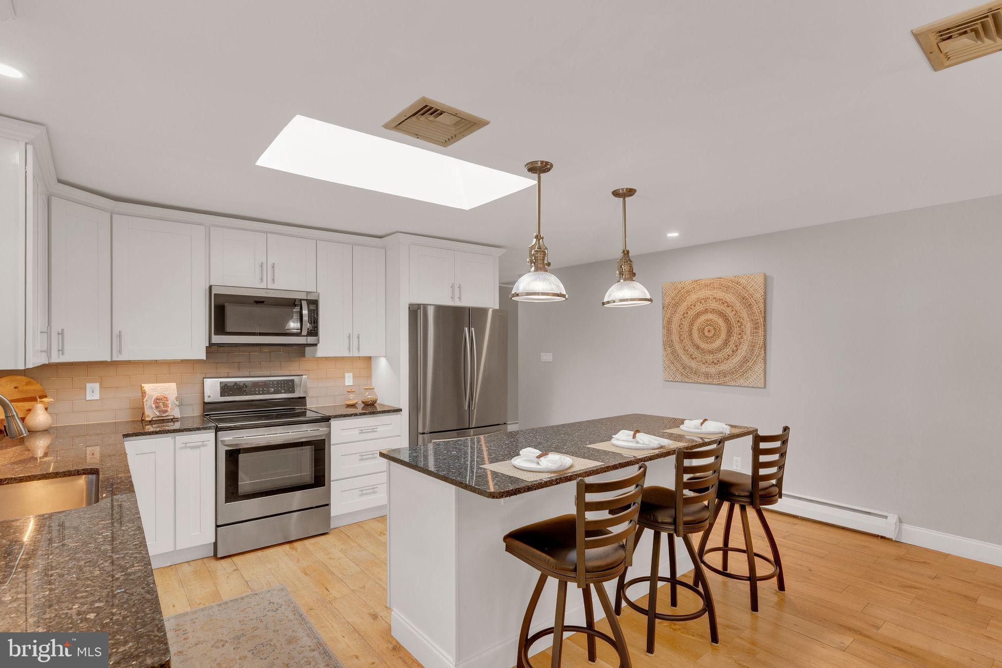 343 Andrew Road Huntingdon Valley, PA 19006 - Photo 8 of 33 island seating & extra storage