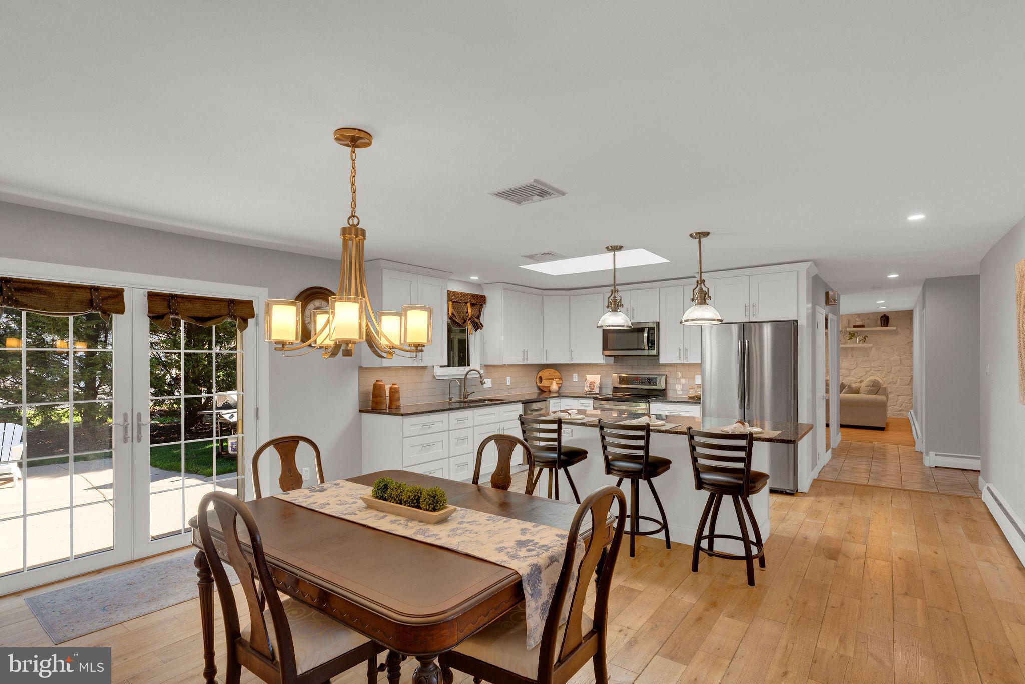 343 Andrew Road Huntingdon Valley, PA 19006 - Photo 9 of 33 kitchen opens to spacious breakfast area