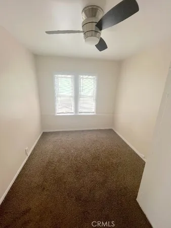a view of empty room with a window