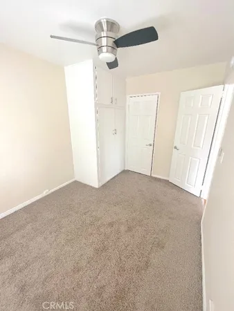 a bathroom with a sink toilet and a mirror