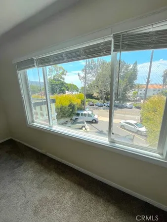 a view of a room and window